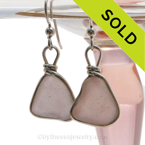 Beautiful flat lightweight peach sea glass pieces from a beach in Seaham England are set in our signature sterling silver Original Wire Bezel© setting.