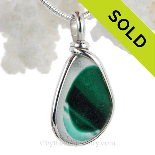 Green Multie color pendant in solid sterling silver setting.
