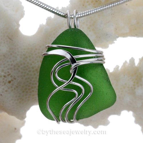 Green sea glass set in our signature Waves© setting