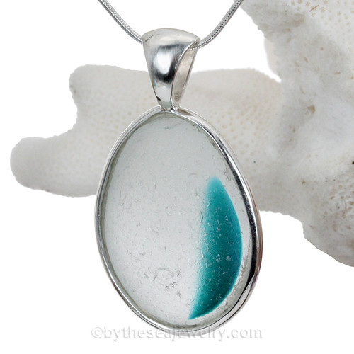 This rare Seaham mixed vivid teal sea glass multi color pendant is set in our Deluxe Wire Bezel© pendant setting.