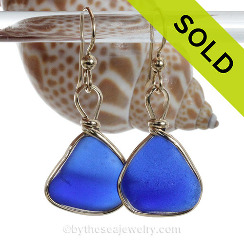 blue sea glass set in our Original Wire Bezel earring setting in gold