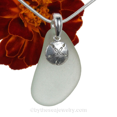 Seafoam green sea glass is combined with a solid sterling bail and sterling charms in this lovely sea glass set.