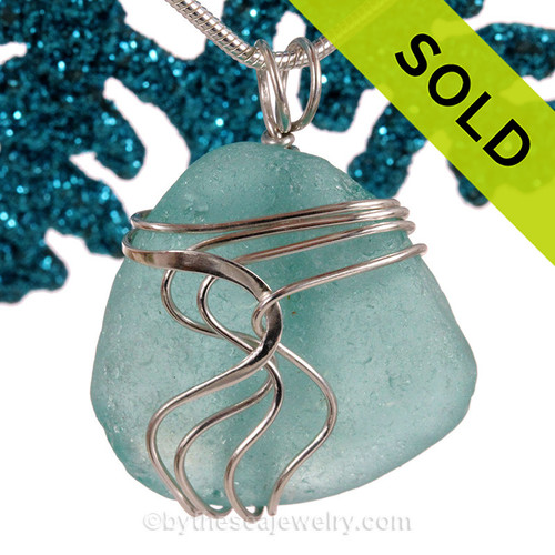 A stunning and LARGE PERFECT Genuine Electric Aqua Sea Glass Pendant set in our Signature Waves© setting in Sterling Silver.