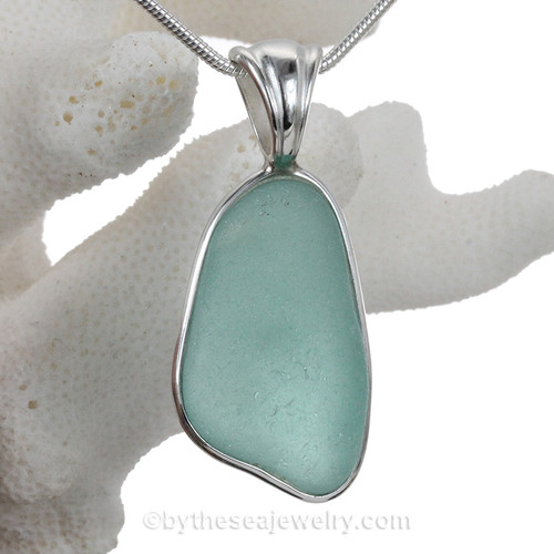 Aqua Genuine Sea Glass set in our Deluxe  Wire Bezel© pendant setting .