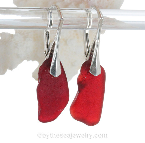 These vivid Ruby Red Natural Sea Glass pieces really glow hanging from these solid sterling silver leverback earrings.