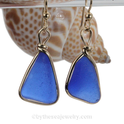 blue sea glass set in our Original Wire Bezel earring setting in gold