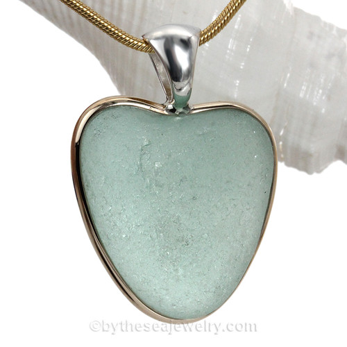 A stunning thick and frosty HUGE Seafoam Green NATURAL found sea glass heart in our deluxe wire bezel pendant setting! 