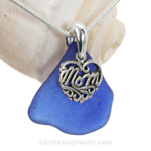 A nice piece of Good Quality Certified Genuine Sea Glass from North Carolina set with a detailed solid sterling Heart charm that lets MOM know you love her. 
