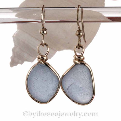 Beautiful natural of Carolina blue sea glass set in our Original Wire Beze©l earring setting.