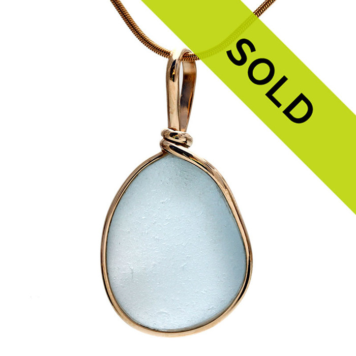 A nice perfect LARGE of vivid pale blue sea glass done in our Original Wire Bezel©2000 necklace pendant setting, it fully secures the glass while leaving both front and back open so you can reach up and feel this antique sea glass. 