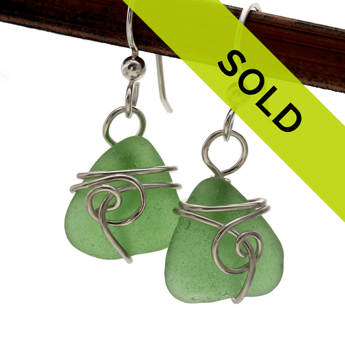 Green sea glass pieces set in our Sea Swirl sterling wire EARRING  setting.
GENUINE UNALTERED sea glass just the way it was found on the beach!

SORRY THESE HAVE SOLD!