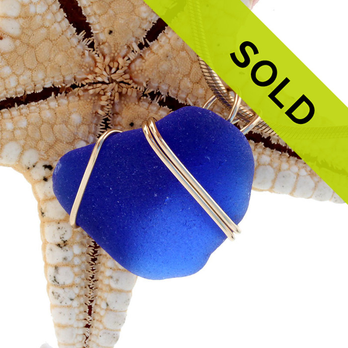 Sorry this blue sea glass necklace pendant in gold has sold!