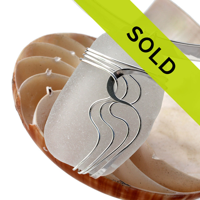 Top quality squarish white sea glass piece set in our sterling silver Waves© pendant setting.
This is a LARGE piece and would look great on any necklace, sterling collar or Omega chain.