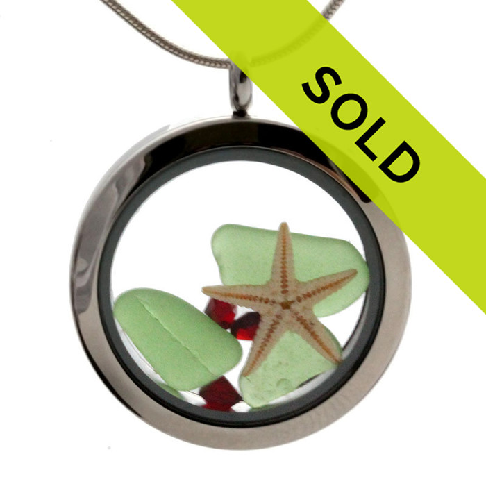 Green sea glass and vivid red gemstones make this a great locket necklace for the holidays.
\Sorry this has sold!