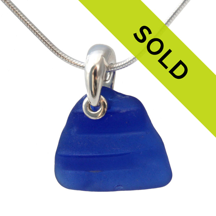 This textured blue ridged sea glass necklace in sterling has been SOLD!