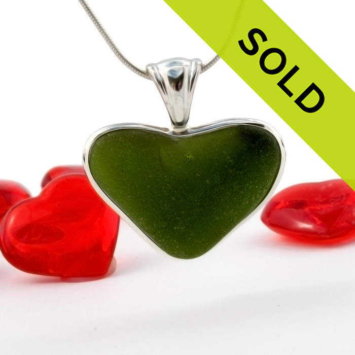 A LARGE natural deep green sea glass heart set in our Deluxe Wire Bezel©
A great necklace for any time of year and perfect for any sea glass lover!