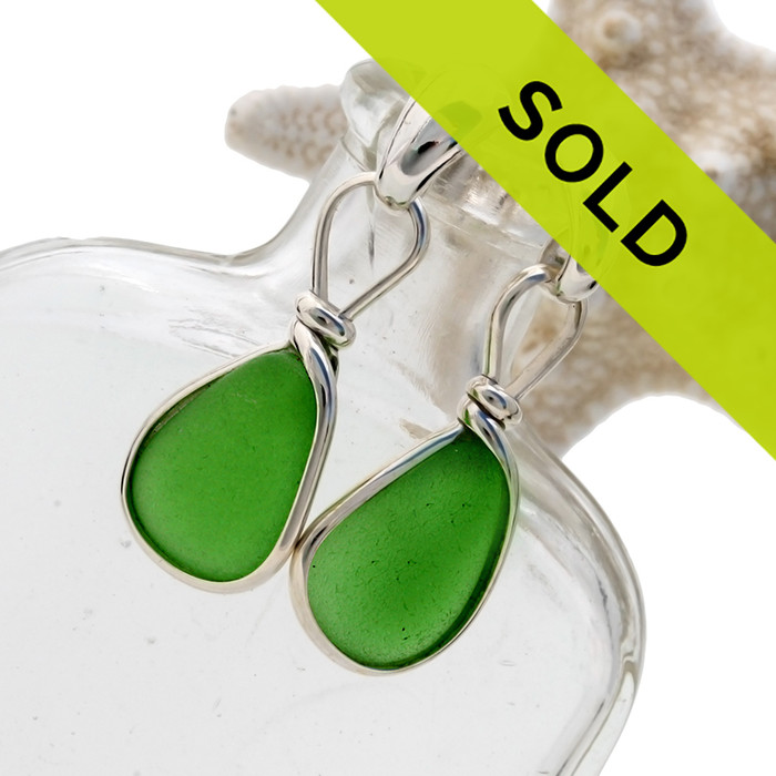 Vivid and stunning genuine green sea glass pieces set in our signature Original Wire Bezel© setting and presented on solid sterling posts.