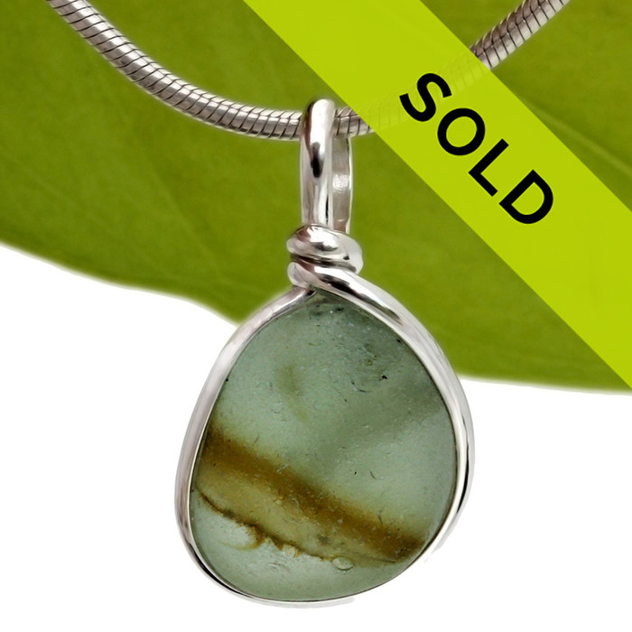 Stunning mixed moss green English sea glass from Seaham England set in our Original Wire Bezel Setting.
Sorry this sea glass jewelry item has sold!