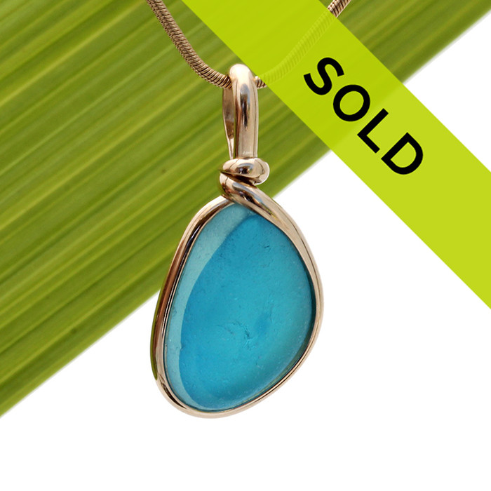 Our Original Wire Bezel© sea glass pendant setting lets all the beauty of this piece shine. A 14K Rolled Gold bezel encases the sea glass and does NOT ALTER it from the way it was found on the beach in the UK.
