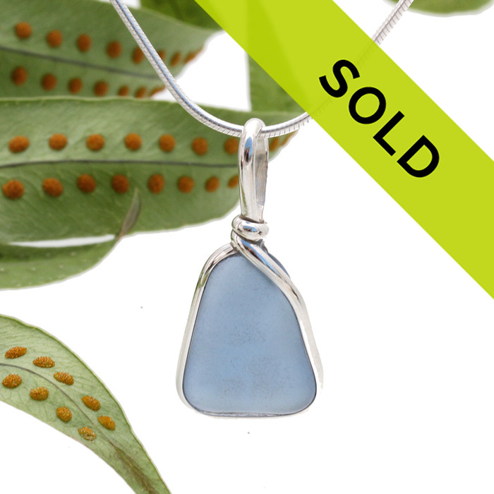 A carolina blue sea glass necklace pendant in our Original Wire Bezel setting.
Sorry this pendant has sold!