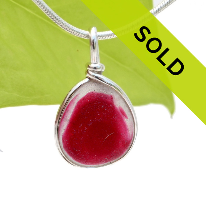 A vivid mix of hot pink and pure white EndoDay sea glass from England set in our Original Wire Bezel© necklace pendant setting.
Sorry this sea glass jewelry piece has been sold!
