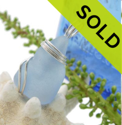 SOLD

A beautiful piece of Outer Banks sea glass in an great Carolina Blue color. This is set securely in a simple sterling setting that leaves much of the glass open so you can feel the tactile texture of this magical glass.