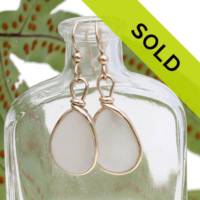 Perfect and natural UNALTERED white sea glass set in our Original Wire Bezel© setting.
Sorry this pair has sold!