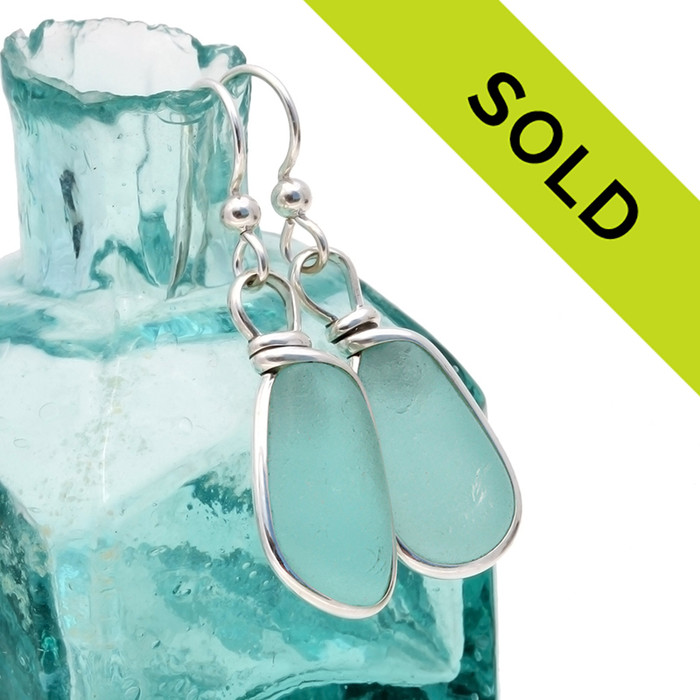 Beautiful tropical aqua sea glass set in our Original Wire Bezel© setting in sterling silver.
Sorry these earrings are no longer for sale.