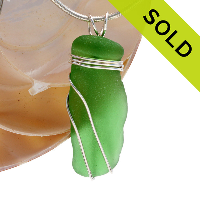 Vivid long green sea glass is set in our secure triple sterling setting.
A great pendant for any necklace.