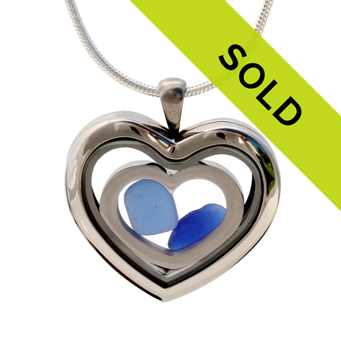 A natural blue sea glass heart combined a large silver heart in this sea glass locket necklace.
Sorry this locket has been sold!