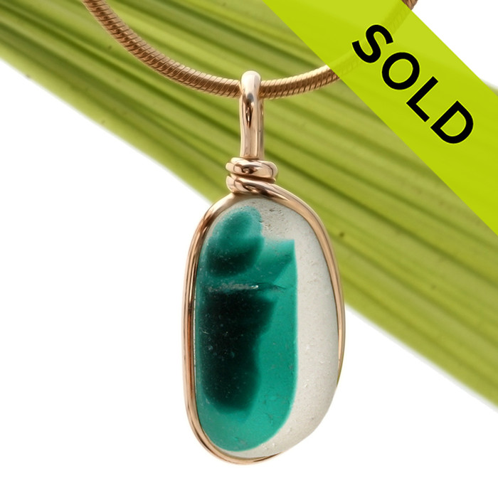 This is a stunning piece of longer mixed teal green EndODay sea glass set in our Original Wire Bezel© pendant setting in gold. Classic and timeless.
SOLD - Sorry this Ultra Rare Sea Glass Jewelry selection is NO LONGER AVALABLE!