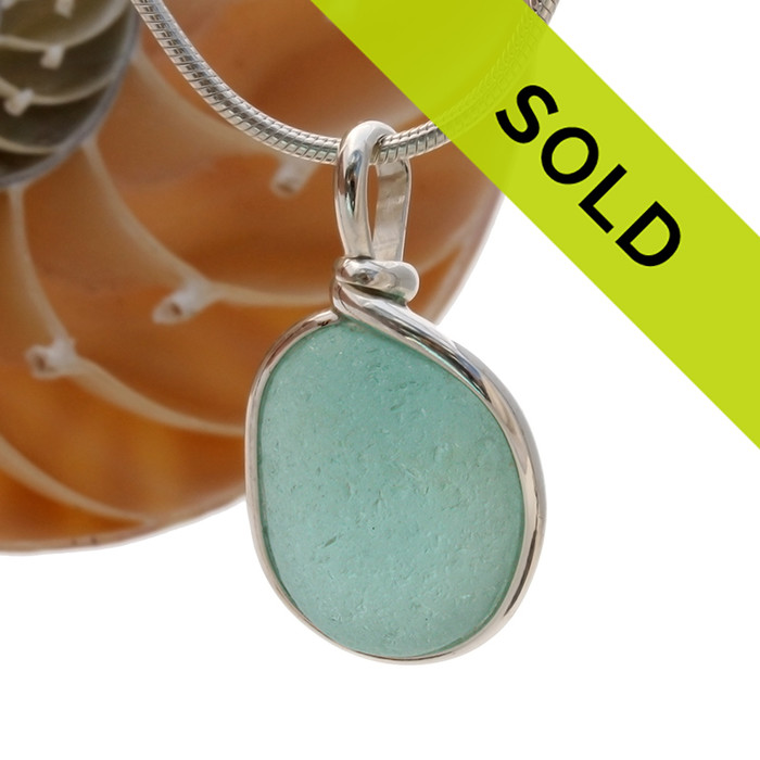 A perfect piece of aqua blue sea glass in our Original Wire bezel© necklace pendant setting.
Sorry this sea glass jewelry piece has been sold!