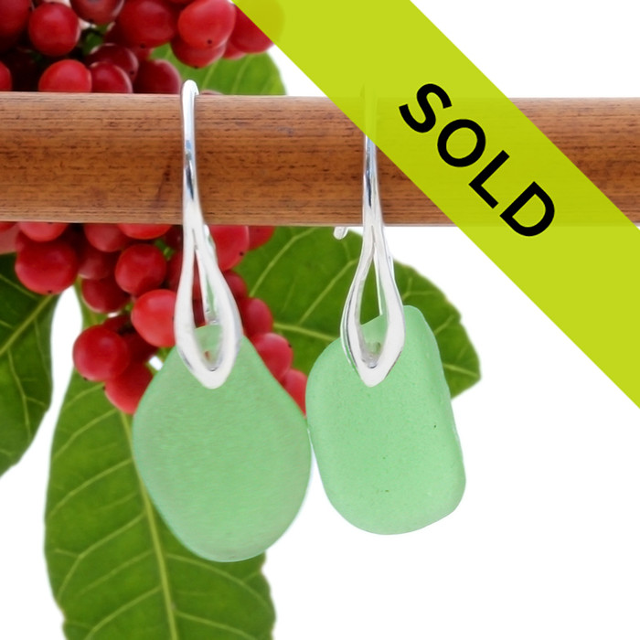 A pair of beach found Sea Glass Earrings in an vivid Green on Sterling Silver deco hooks.
Sorry this sea glass jewelry item has sold!