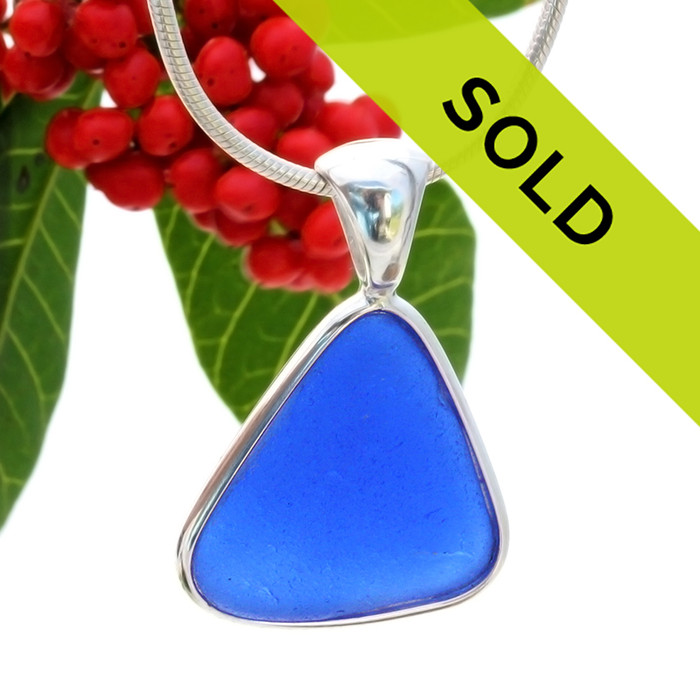 Sorry this sea glass necklace pendant has already been sold!
This sea glass a necklace pendant is a Perfect Cobalt Blue. It is set in a solid sterling silver Deluxe Wire Bezel setting. Very Versatile and elegant. CLASSIC!
