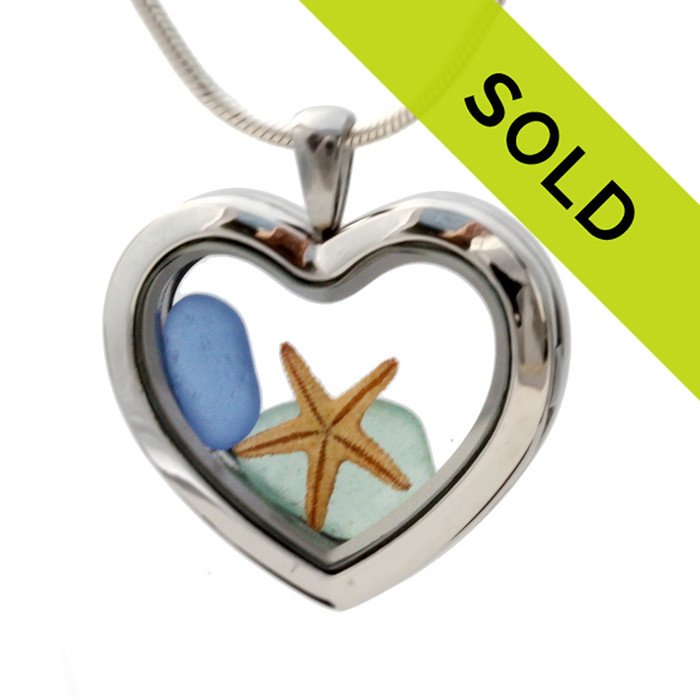 Small tropical Aqua  and Carolina Blue sea glass pieces combined with a real starfish in a feminine heart shaped locket magnetic stainless steel locket necklace! Sorry this sea glass jewelry piece has been sold!