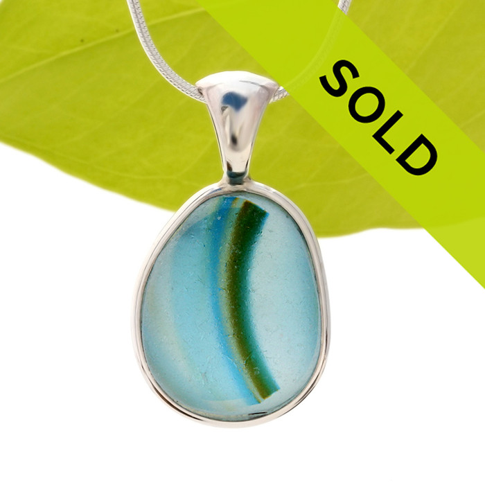 This ultra rare Seaham sea glass multi color pendant is set in our Deluxe Wire Bezel© pendant setting.
Classic and elegant, a timeless treasure!
Sorry this sea glass jewelry piece has already been sold!