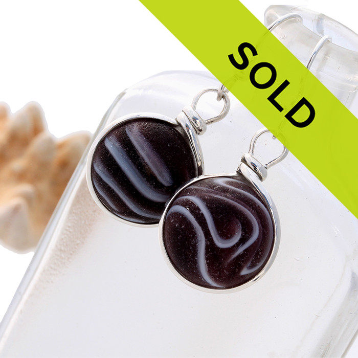 Sorry this one of a kind pair of sea glass earrings is no longer for sale.