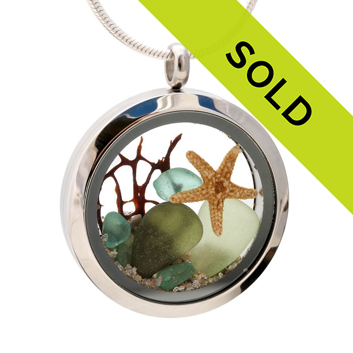 Seafoam, Olive and Aqua Green genuine beach found sea glass combined with a real starfish and seafan, a real underwater scene.
Sorry this sea glass jewelry selection has been sold!
