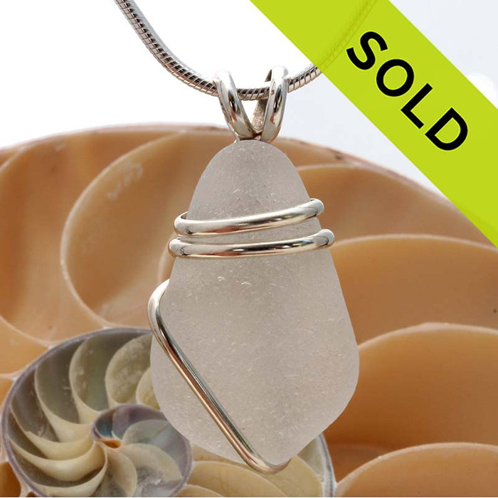 A nice genuine Sea Glass Pendant  in white and a simple sterling silver setting in a half round thicker wire.
SOLD, Sorry this Sea Glass Jewelry selection is NO LONGER AVAILABLE!