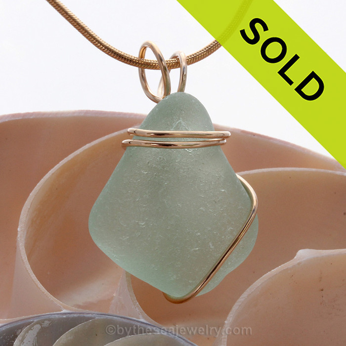 Aqua blue sea glass necklace pendant in simple gold setting. Sorry this Sea Glass Jewelry piece has been sold!
