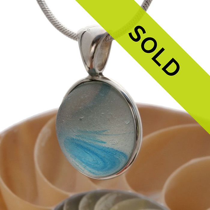 A  natural beach found mixed aqua blue sea glass gemball set in our Deluxe Wire Bezel©.
Sorry this ultra rare sea glass jewelry piece has been sold!