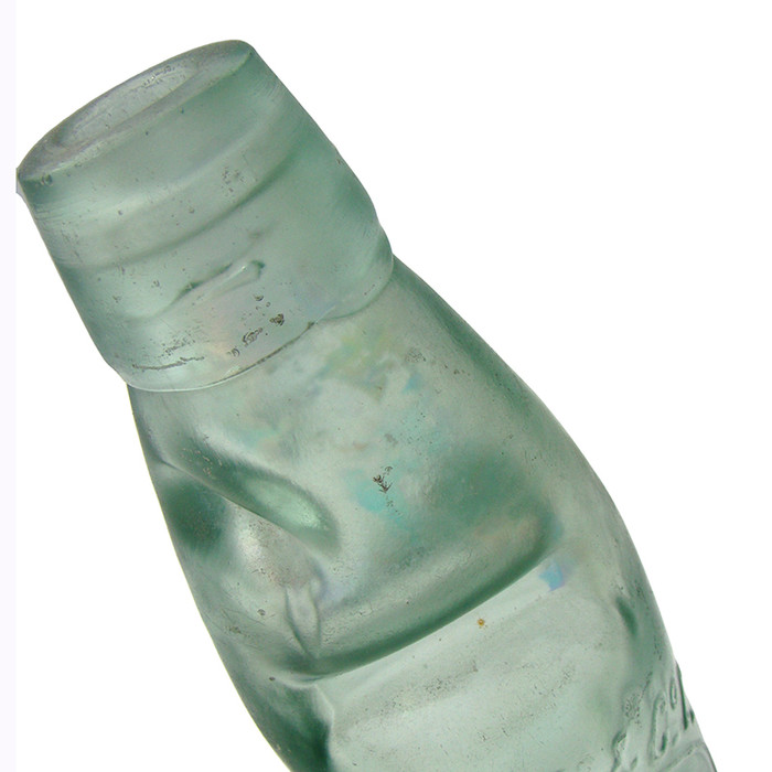 Codd Bottles used glass marbles that were "pushed up" by the carbonation of the drink, sealing the bottle.