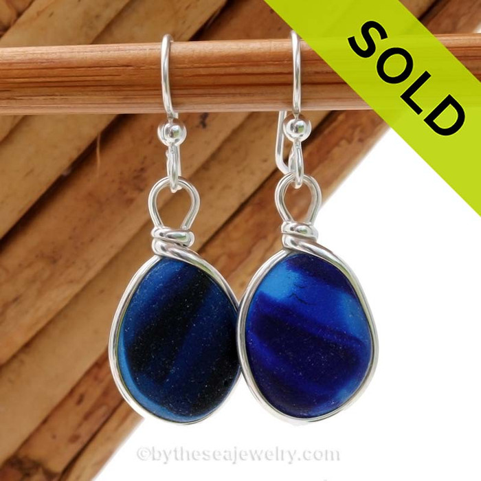 A great match in my English Multi Sea Glass Earrings in a vivid mixed deep cobalt Blue set in our Original Wire Bezel© setting in silver.
Sorry this pair of Ultra Rare Sea Glass Earrings has been sold!