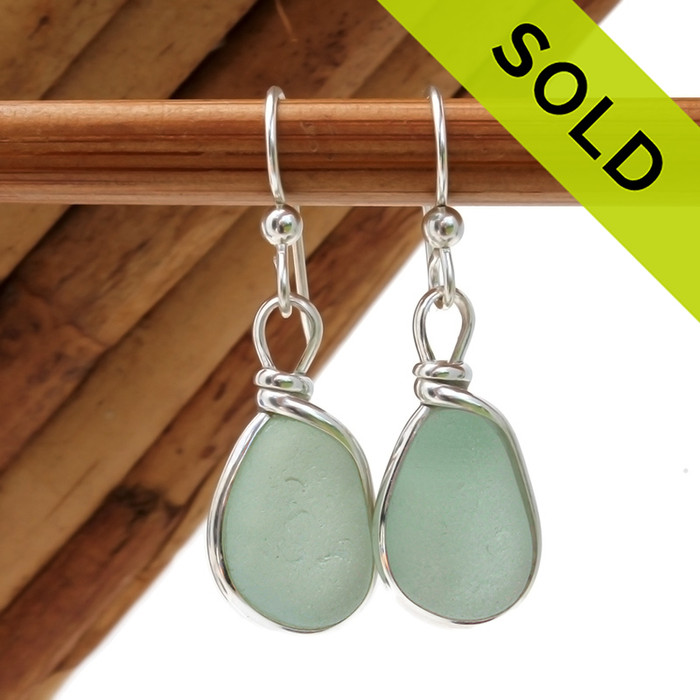 Perfect pieces of all natural genuine beach found sea glass in a beautiful Seafoam Green in our original Wire Bezel© Earring Setting.
Sorry these Sea Glass Earrings are no longer available.