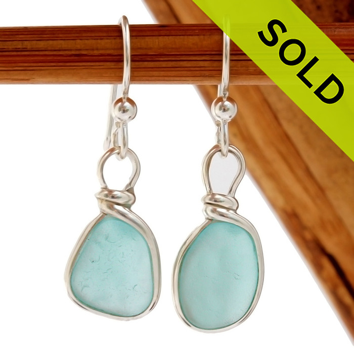 Smaller petite pieces of naturally collected Aqua Blue sea glass in our ORIGINAL Wire Bezel© setting in Silver.
SOLD - These Sea Glass Earrings are NO LONGER AVAILABL