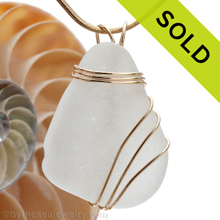 A very LARGE perfect top quality piece of Genuine Sea Glass in a triple wire wrapped gold pendant setting.
SOLD - Sorry this Sea Glass Jewelry Selection is NO LONGER AVAILABLE!