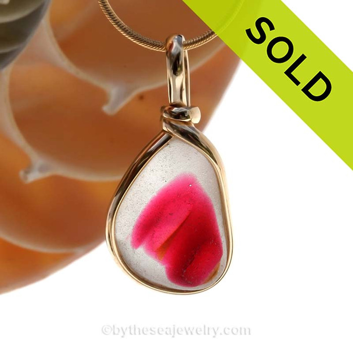 A mixed vivid tourmaline pink color on this English Sea Glass Pendant set in our Original Wire Bezel© necklace pendant setting in 14K Rolled Gold.
SOLD - Sorry this Sea Glass Jewelry Item has been SOLD!