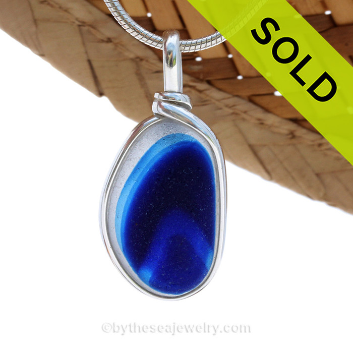 An rich vivid mixed Blue English Multi sea glass set for a necklace in our Original Sea Glass Bezel© in solid sterling silver setting.
Sorry this one of a kind piece of Sea Glass Jewelry has been SOLD!