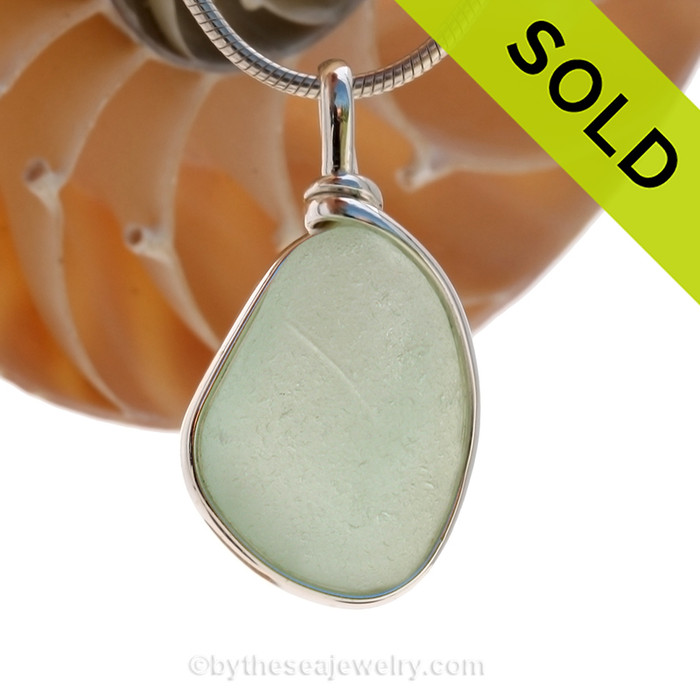 A neat triangular seafoam green natural sea glass in my Original Sterling Wire Bezel© a simple design that lets all the beauty of this glass shine. 
SOLD - Sorry this Sea Glass Pendant is NO LONGER AVAILABLE!