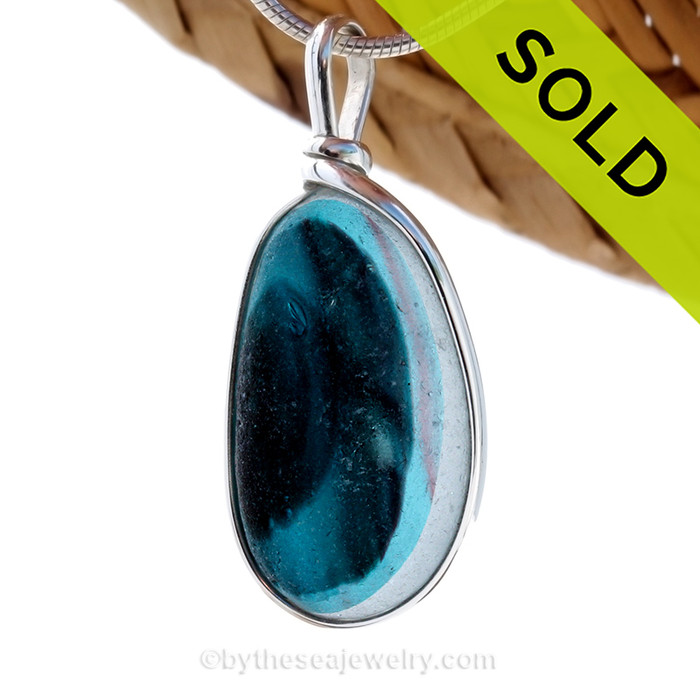 An unusual piece of mixed Long Teal Green English Multi sea glass set for a necklace in our Original Sea Glass Bezel© in solid sterling silver setting.
SOLD - Sorry This Sea Glass Jewerly Selection Is NO LONGER AVAILABLE